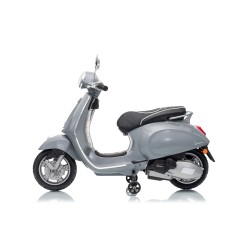 Vespa Primavera Elettrica per Bambini 12V Licenza Ufficiale Piaggio Sedile Pelle Luci LED suono Clacson