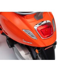 Vespa Primavera Elettrica per Bambini 12V Licenza Ufficiale Piaggio Sedile Pelle Luci LED suono Clacson Arancione