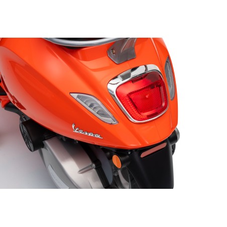 Vespa Primavera Elettrica per Bambini 12V Licenza Ufficiale Piaggio Sedile Pelle Luci LED suono Clacson Arancione